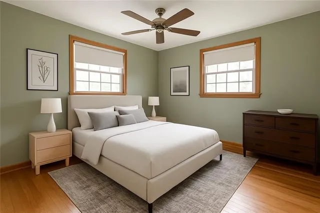 a bedroom with a bed and window