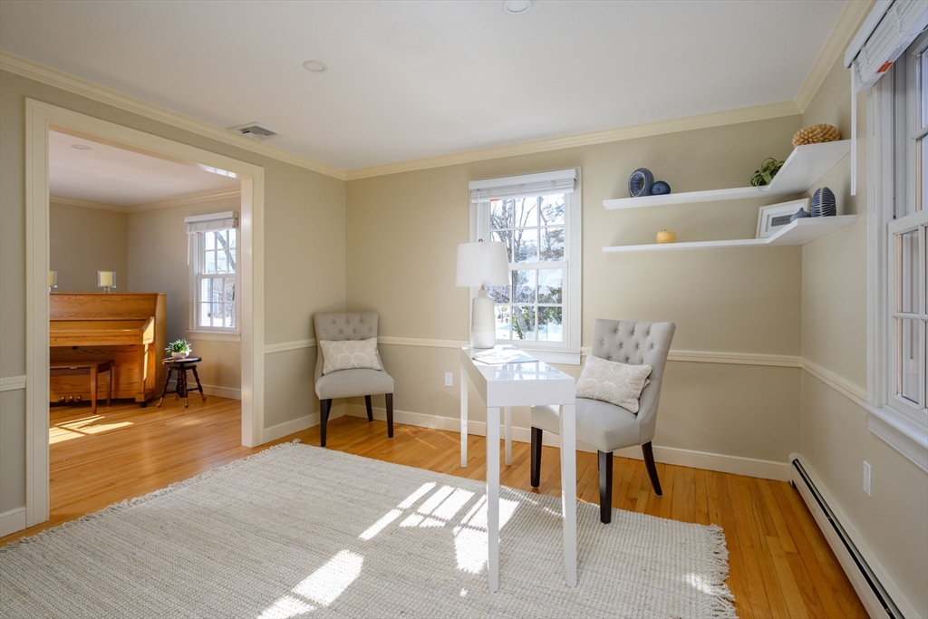 7 Village Lane Hingham, MA 02043 - Photo 17 of 34 a living room with furniture and a table