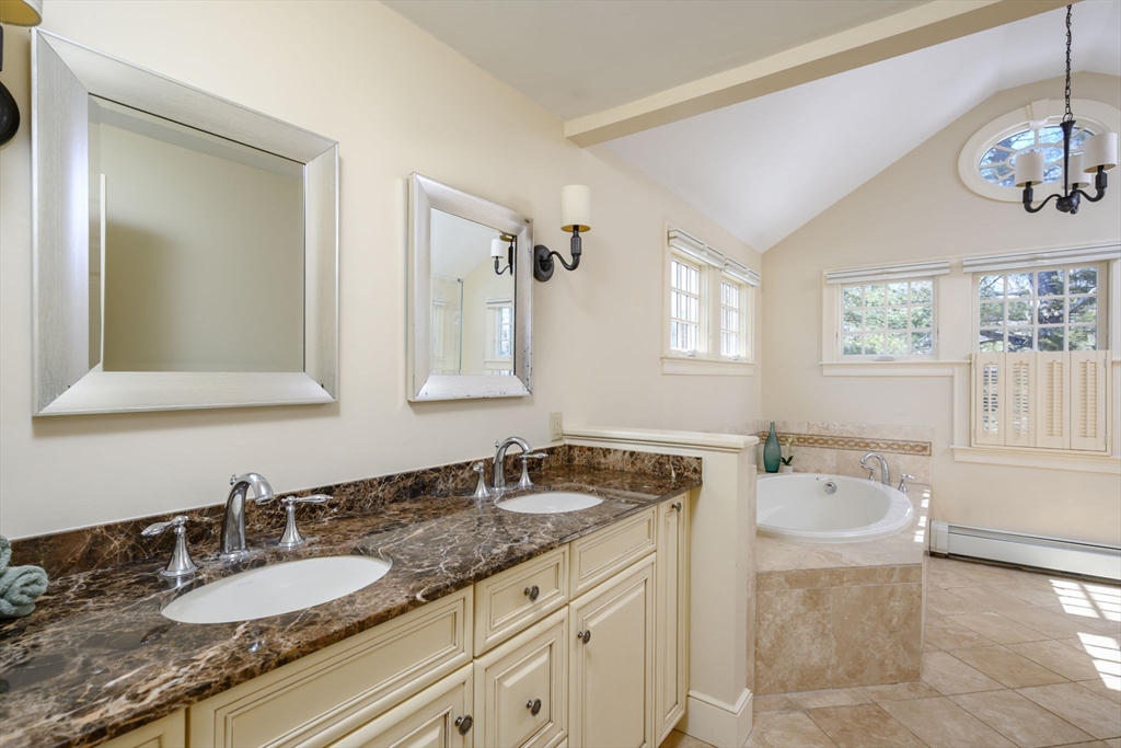 7 Village Lane Hingham, MA 02043 - Photo 19 of 34 a bathroom with a granite countertop double vanity sink and mirror