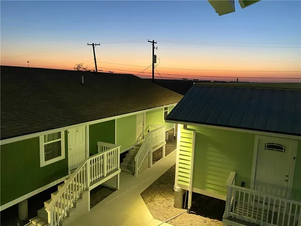 a view of a balcony with an outdoor space