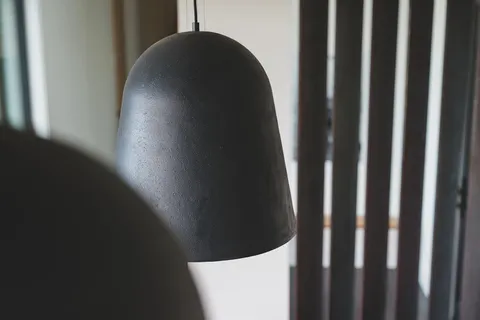 a bedroom with a bed and a table