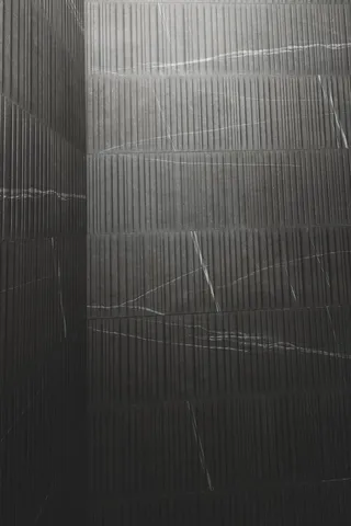 a bedroom with a bed and a potted plant