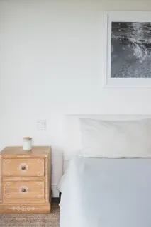 a spacious bathroom with a sink a washer and dryer