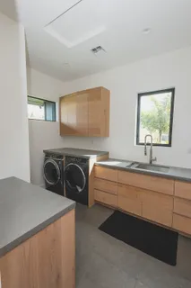 a view of swimming pool with outdoor seating