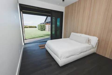 a view of a field with an ocean