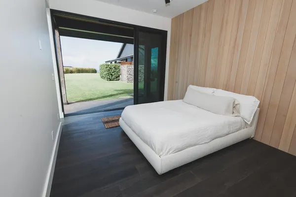 a view of a field with an ocean