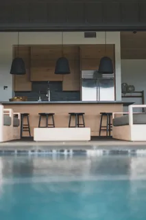 a view of living room kitchen and dining area
