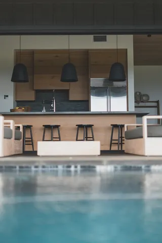 a view of living room kitchen and dining area