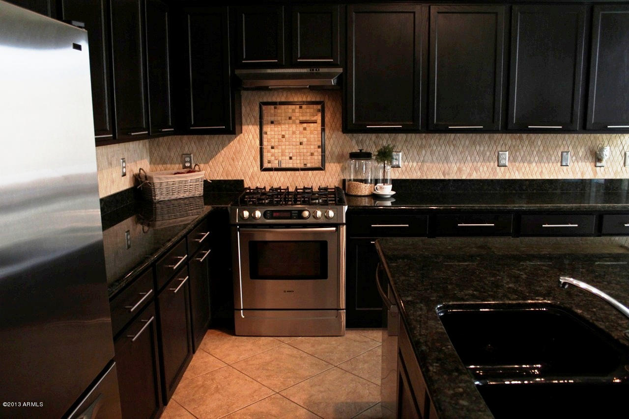 21032 West Ridge Road Buckeye, AZ 85396 - Photo 3 of 24 Espresso Cabinets