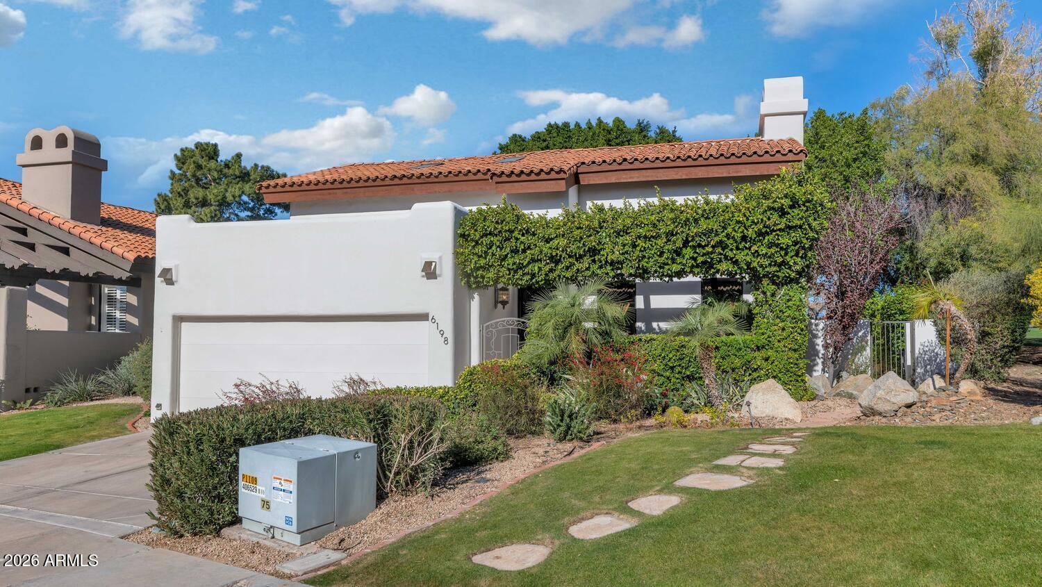a view of a back yard of the house