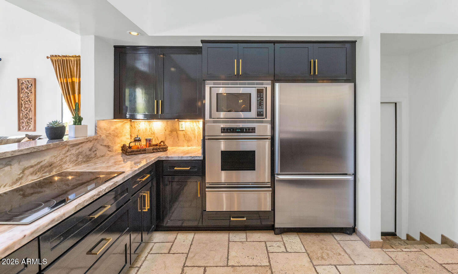 6198 North 28th Place Phoenix, AZ 85016 - Photo 11 of 33 a kitchen with a refrigerator and a sink