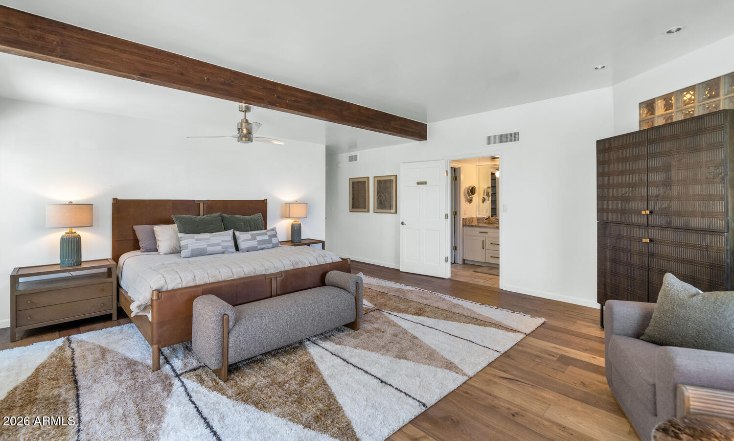 6198 North 28th Place Phoenix, AZ 85016 - Photo 13 of 33 a bed room with a bed and a couch