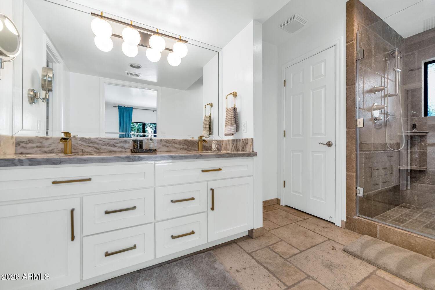 6198 North 28th Place Phoenix, AZ 85016 - Photo 15 of 33 a bathroom with a granite countertop sink mirror and shower