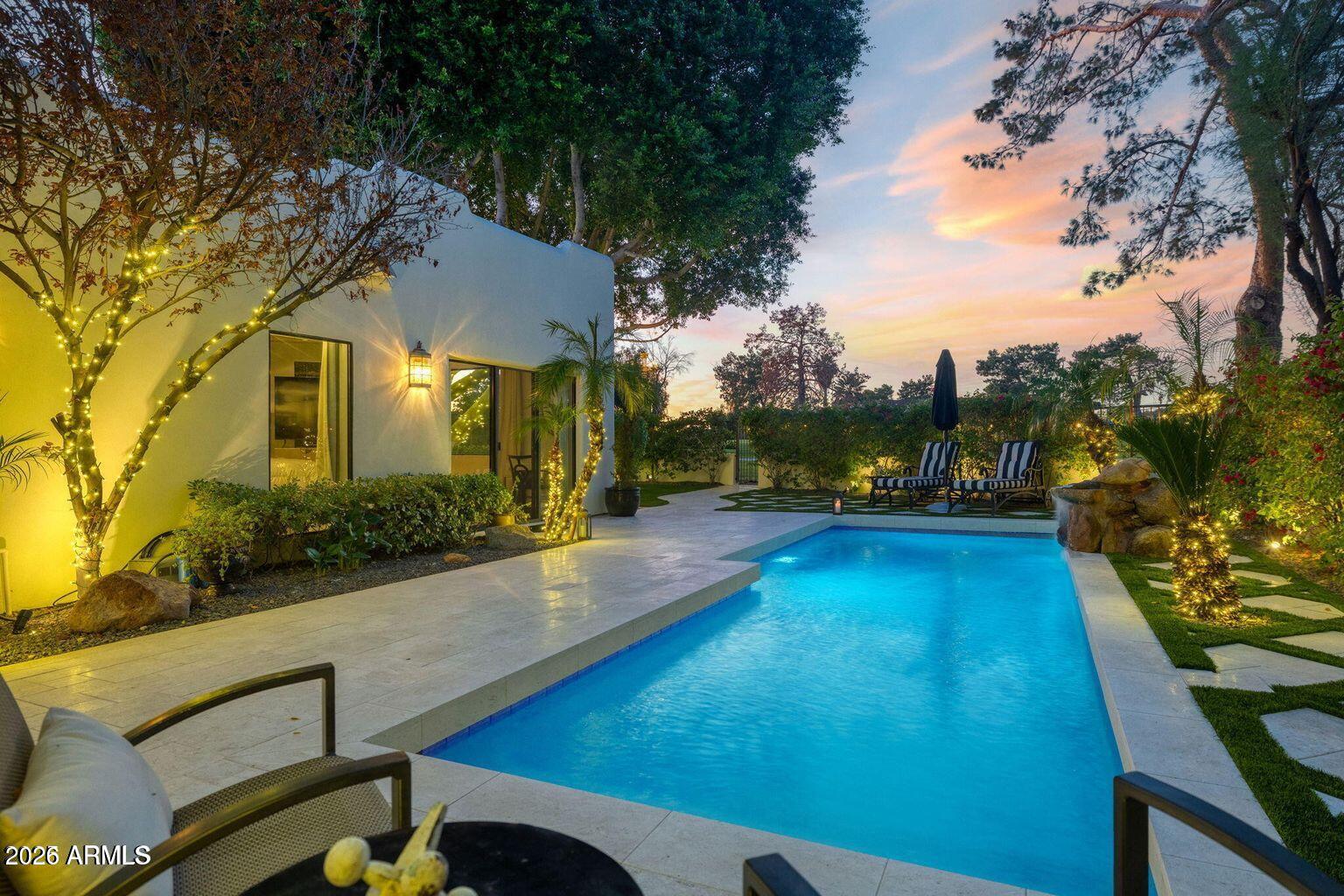 6198 North 28th Place Phoenix, AZ 85016 - Photo 16 of 21 a view of a yard with plants and a patio