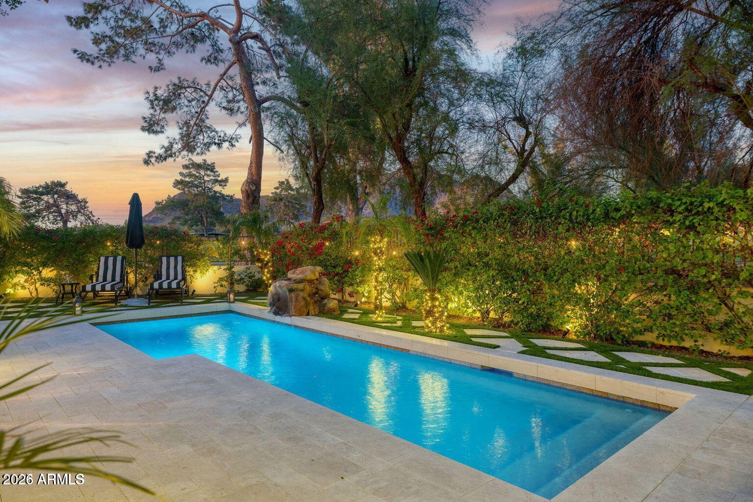 6198 North 28th Place Phoenix, AZ 85016 - Photo 17 of 21 a view of swimming pool with seating area