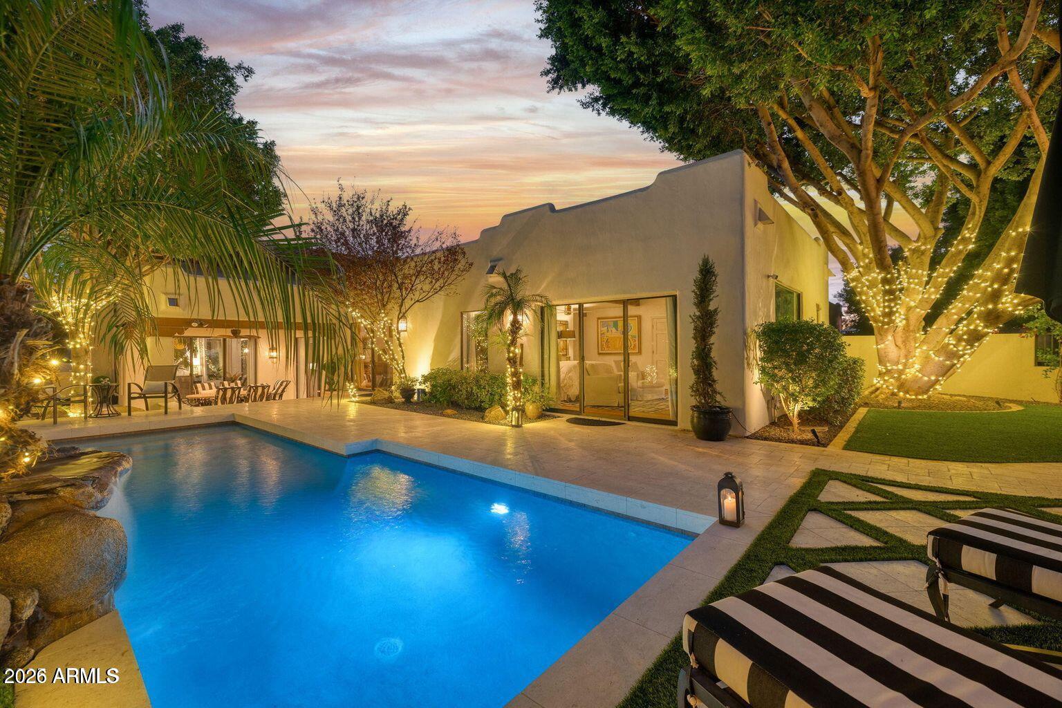 6198 North 28th Place Phoenix, AZ 85016 - Photo 18 of 21 a view of a swimming pool with lounge chairs