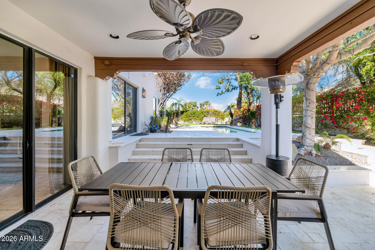 6198 North 28th Place Phoenix, AZ 85016 - Photo 21 of 33 a view of a dining room with furniture window and outside view