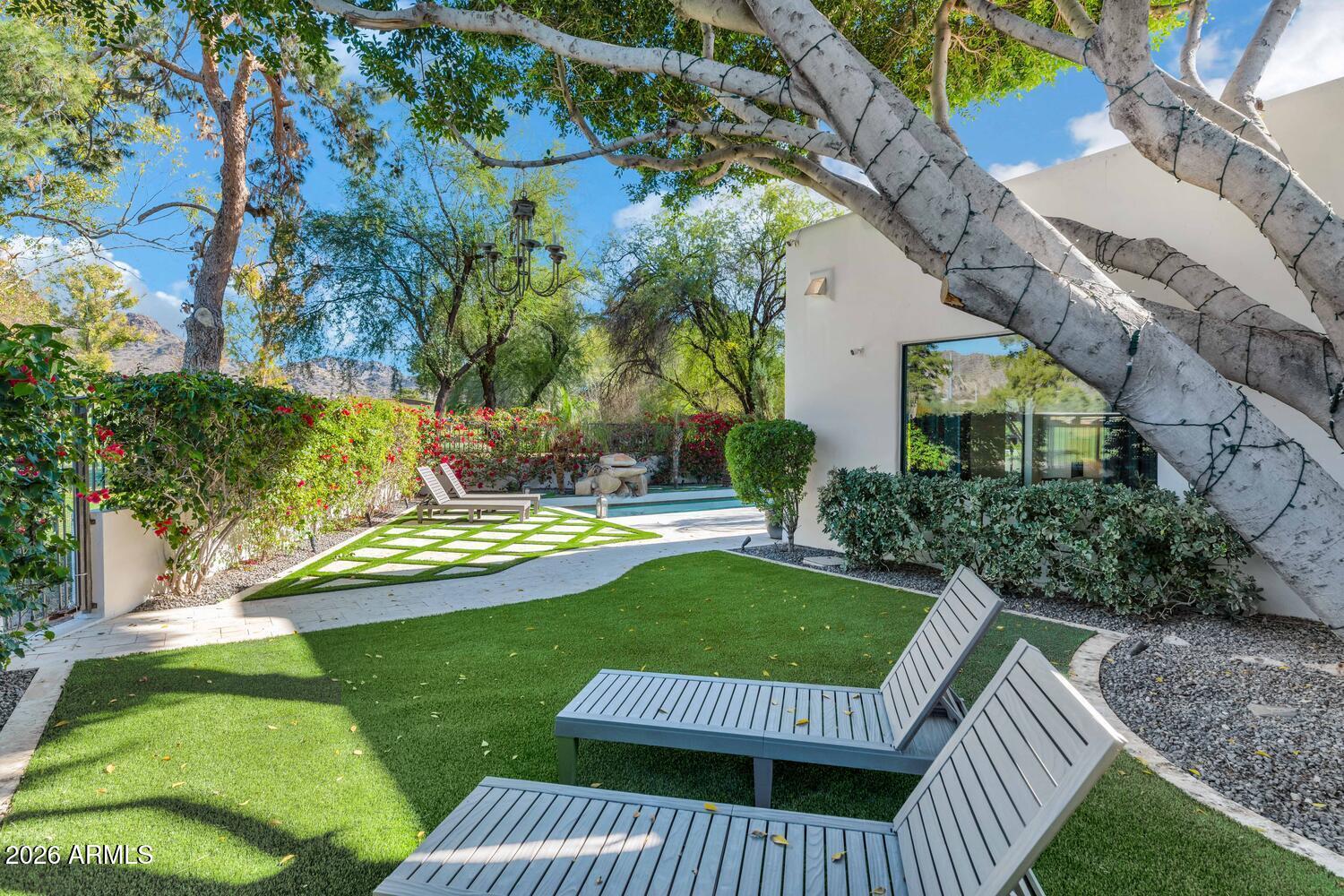 6198 North 28th Place Phoenix, AZ 85016 - Photo 26 of 33 a view of a wooden deck and a yard