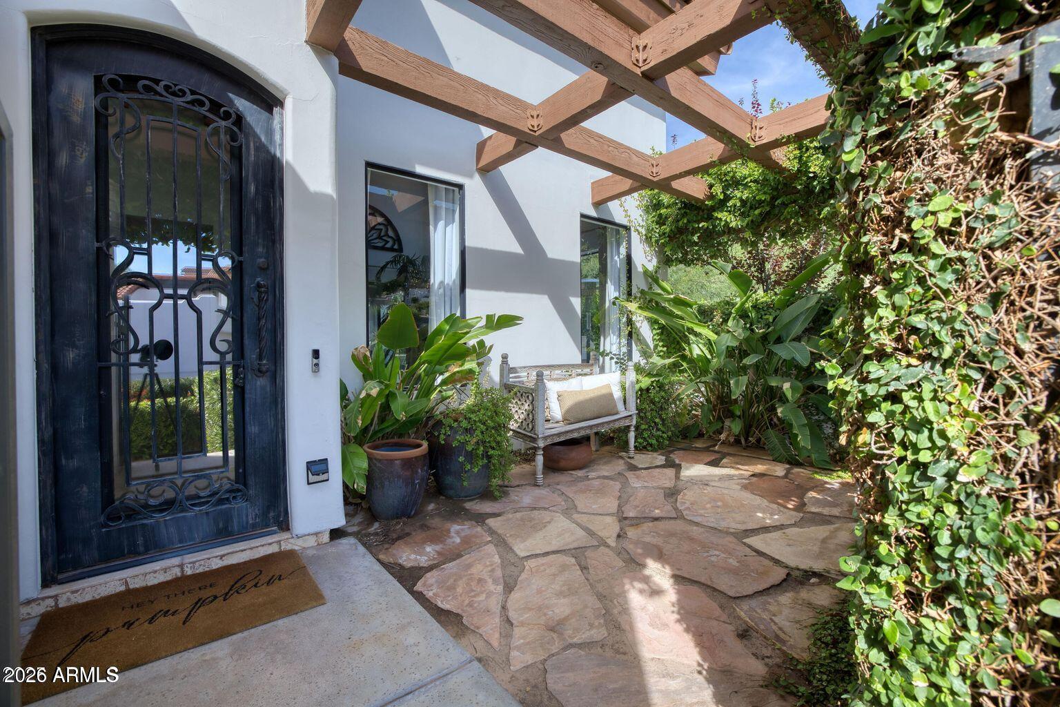 6198 North 28th Place Phoenix, AZ 85016 - Photo 3 of 21 a view of a chairs and table in a patio