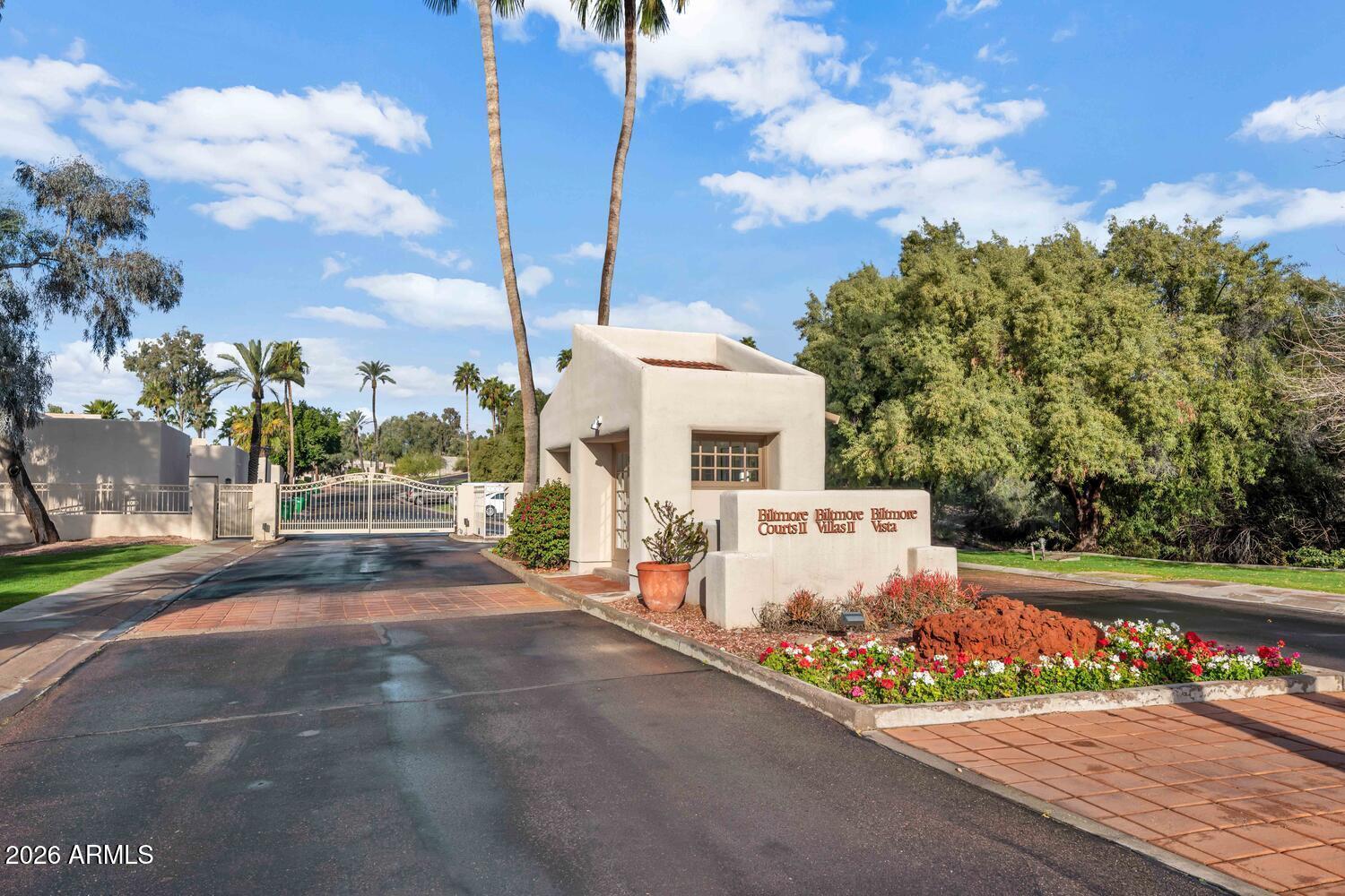 6198 North 28th Place Phoenix, AZ 85016 - Photo 33 of 33 a view of a patio with table and chairs and potted plants
