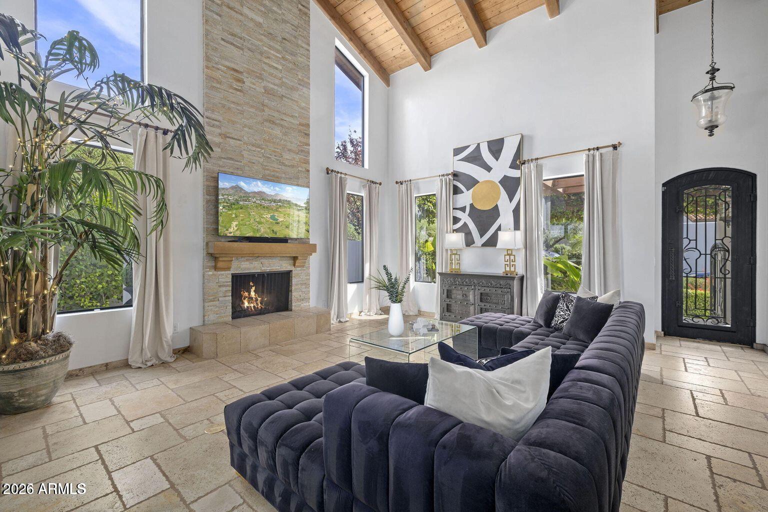 6198 North 28th Place Phoenix, AZ 85016 - Photo 4 of 21 a living room with furniture and a fireplace