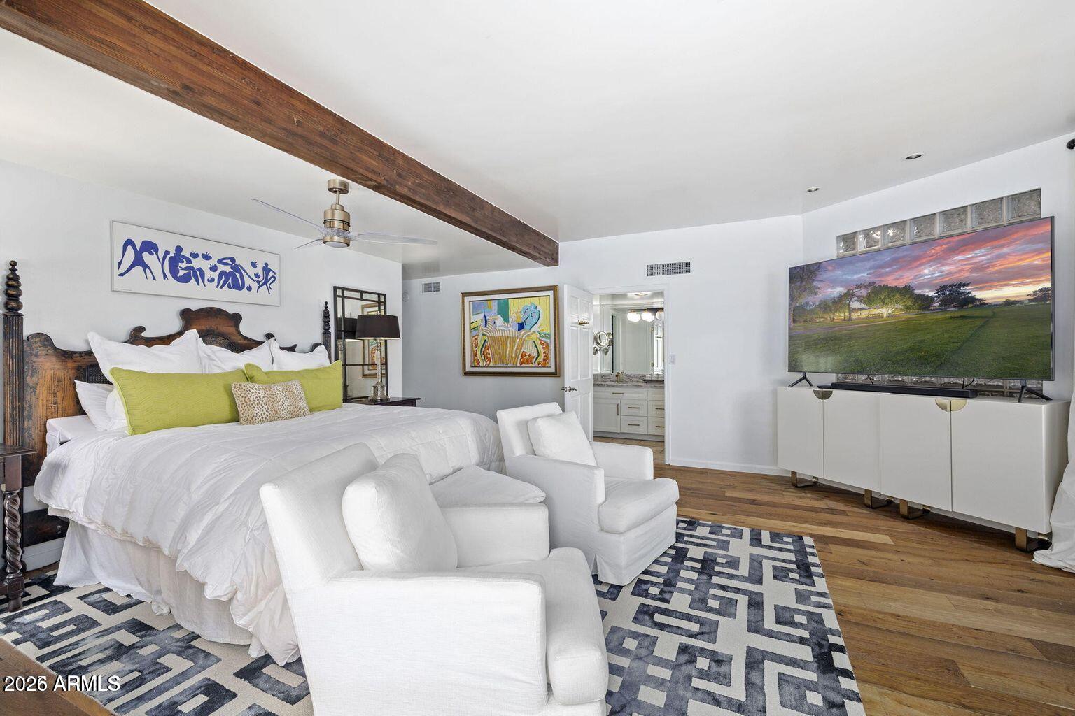 6198 North 28th Place Phoenix, AZ 85016 - Photo 10 of 21 a bedroom with a bed and glass window