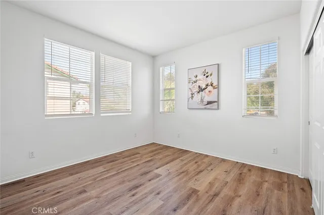 a kitchen with granite countertop a stove and a microwave