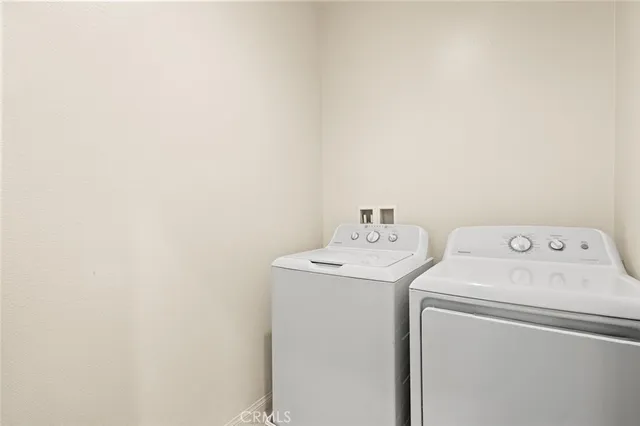 a view of a backyard with sitting area