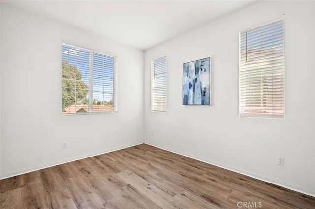an aerial view of a houses with yard