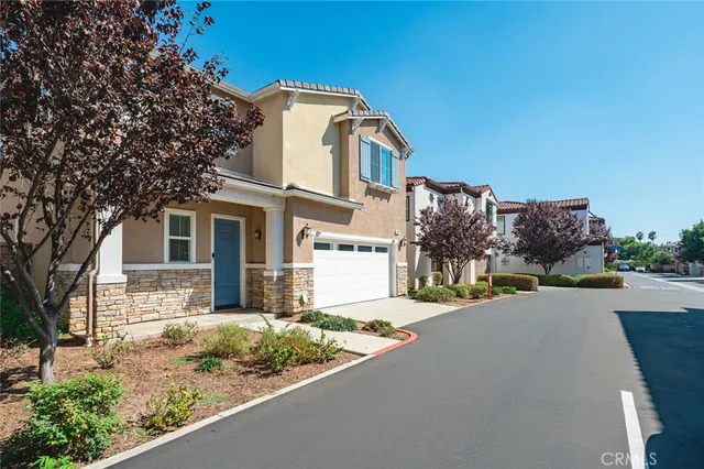 a spacious bathroom with a shower sink and mirror