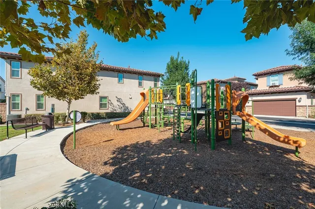 a spacious bathroom with a sink and a mirror