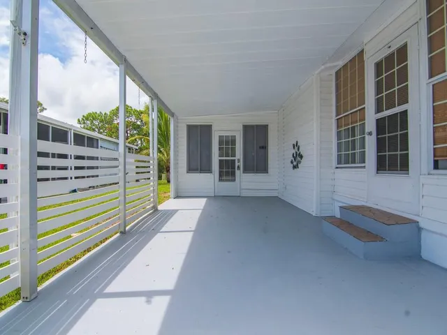 a view of front door with outdoor space
