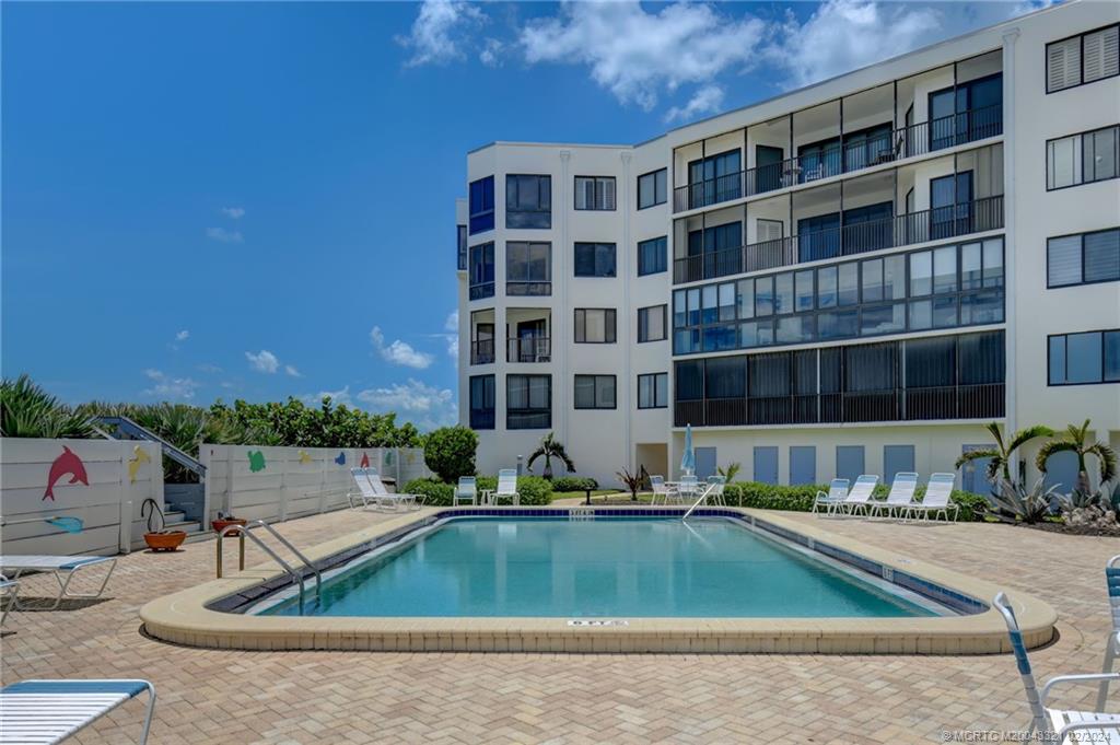 2375 Northeast Ocean Boulevard, Unit E405 Stuart, FL 34996 - Photo 30 of 58 a view of building with outdoor space