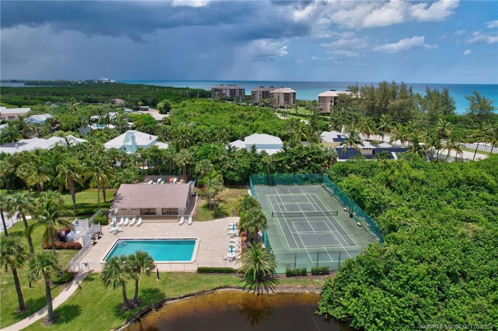 2375 Northeast Ocean Boulevard, Unit E405 Stuart, FL 34996 - Photo 38 of 58 an aerial view of multiple house