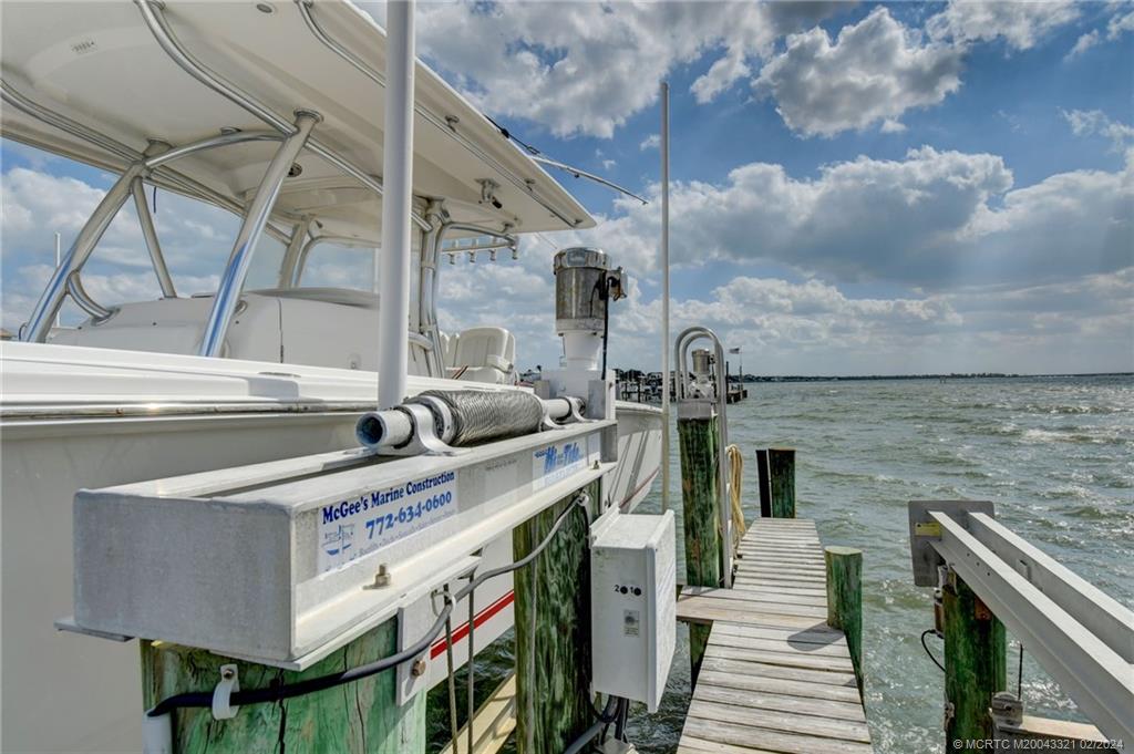2375 Northeast Ocean Boulevard, Unit E405 Stuart, FL 34996 - Photo 44 of 58 a utility room with dryer and washer