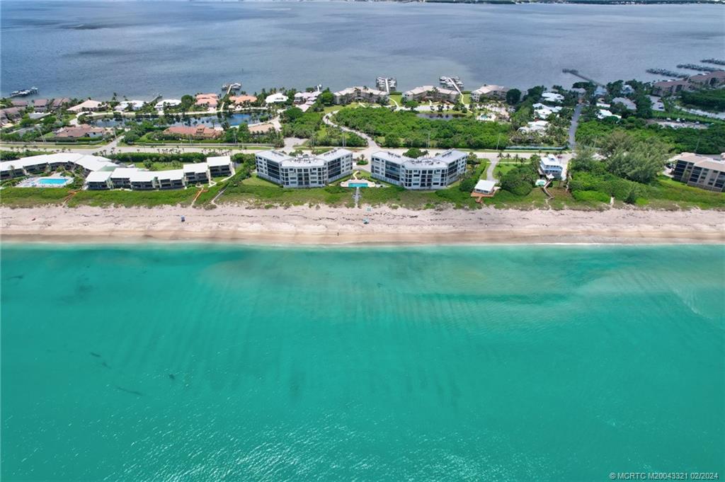 2375 Northeast Ocean Boulevard, Unit E405 Stuart, FL 34996 - Photo 56 of 58 a view of a lake with houses