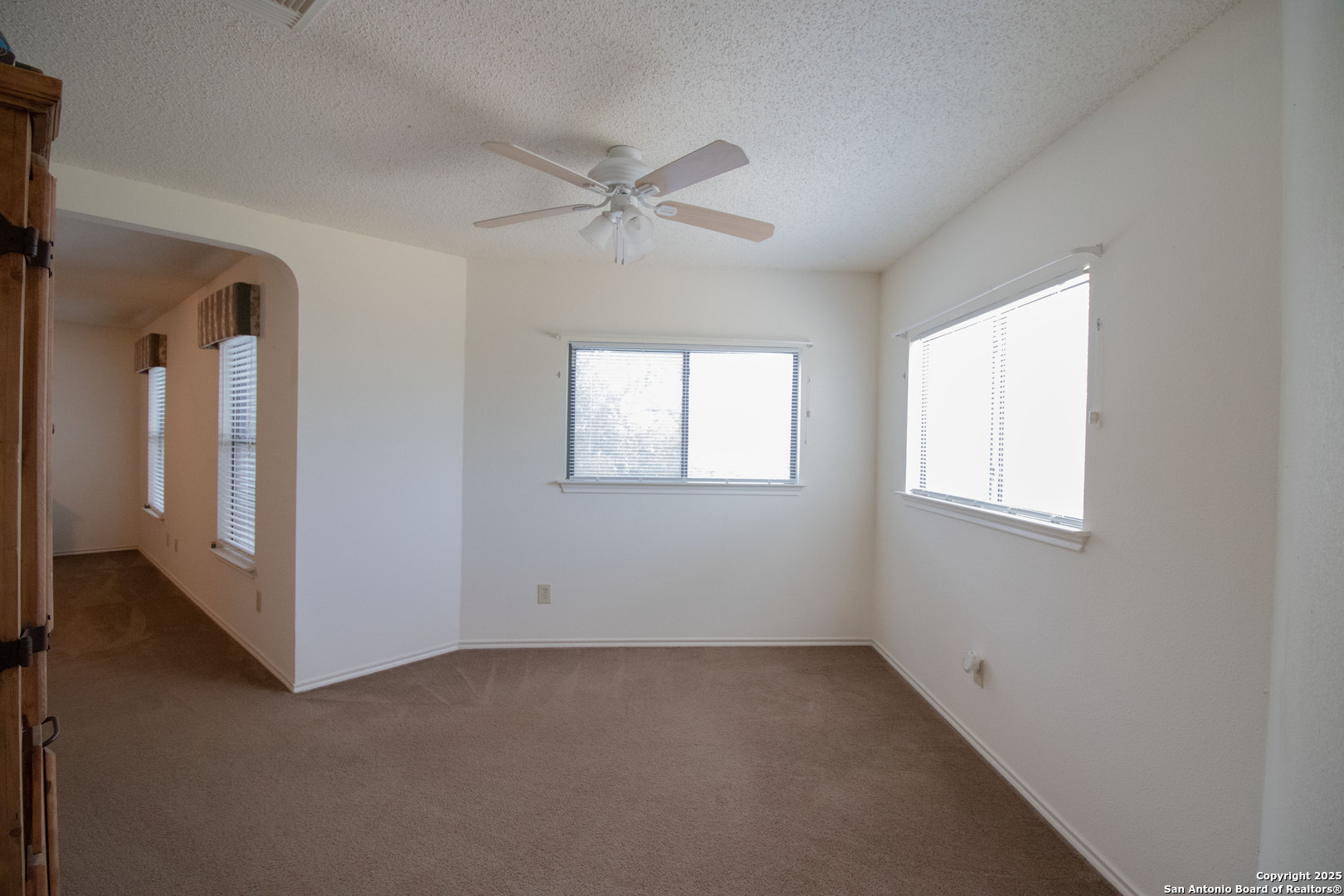 797 Killarney Road Floresville, TX 78114 - Photo 16 of 35 a view of an empty room with a window