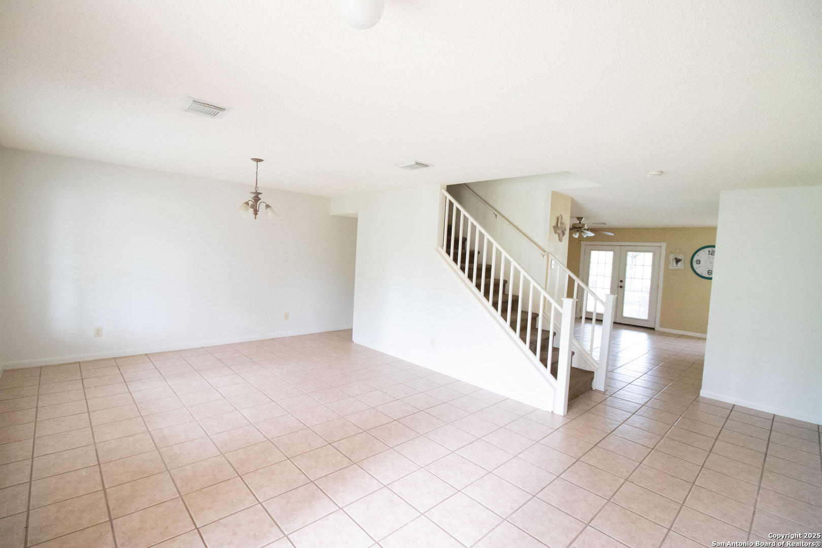797 Killarney Road Floresville, TX 78114 - Photo 6 of 35 a view of a hallway with staircase