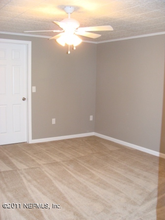 246 Alvis Road Jacksonville, FL 32220 - Photo 22 of 54 a view of an empty room