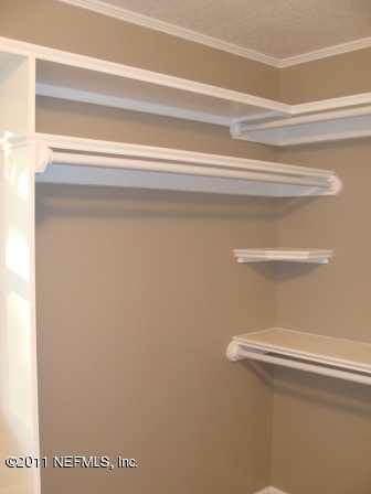 246 Alvis Road Jacksonville, FL 32220 - Photo 24 of 54 a close view of closet