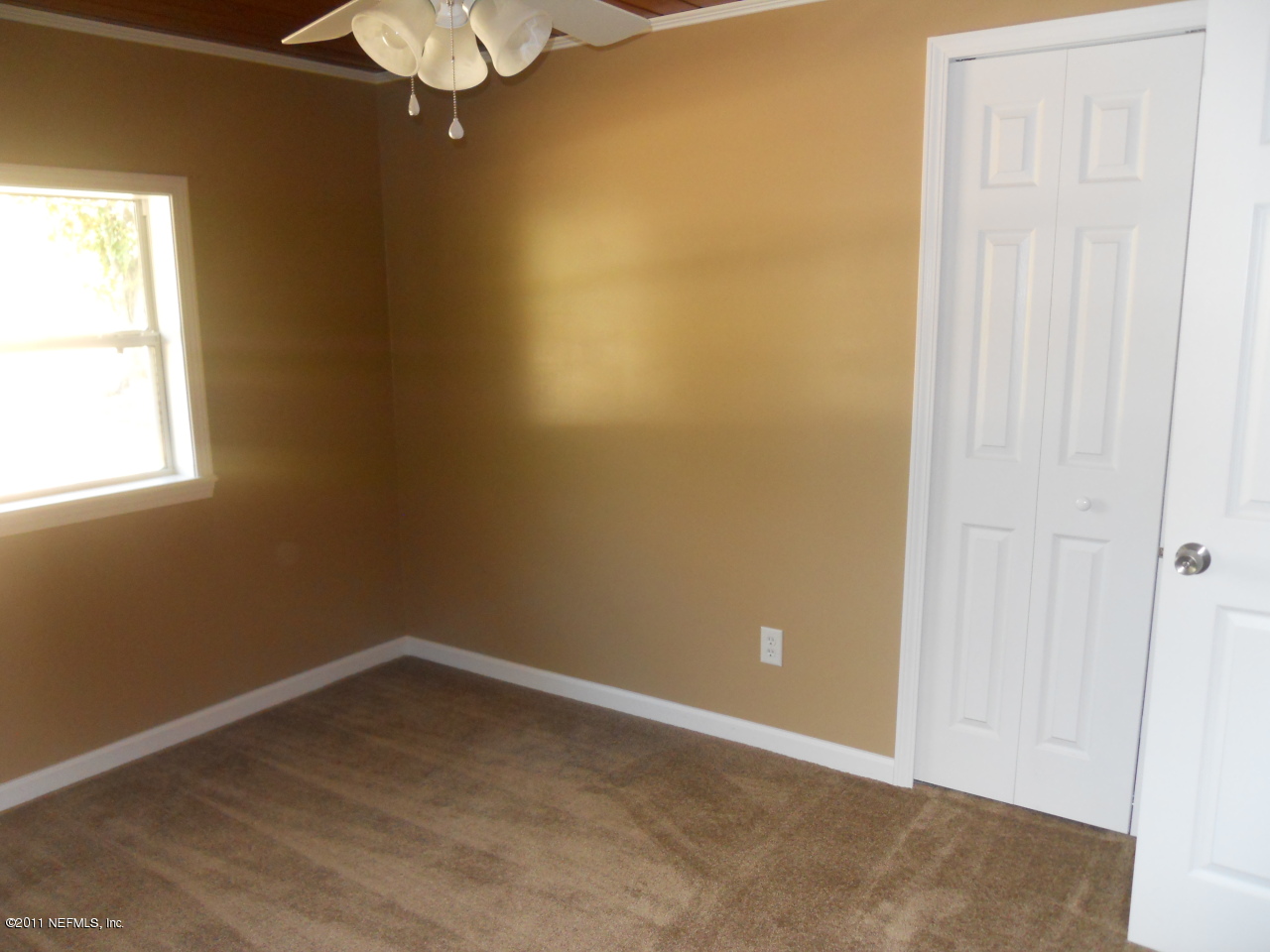 246 Alvis Road Jacksonville, FL 32220 - Photo 31 of 54 an empty room with a window