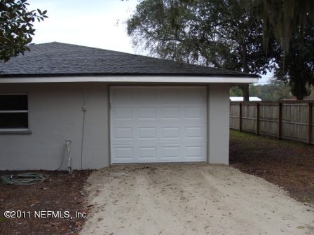 246 Alvis Road Jacksonville, FL 32220 - Photo 43 of 54 a backyard of a house