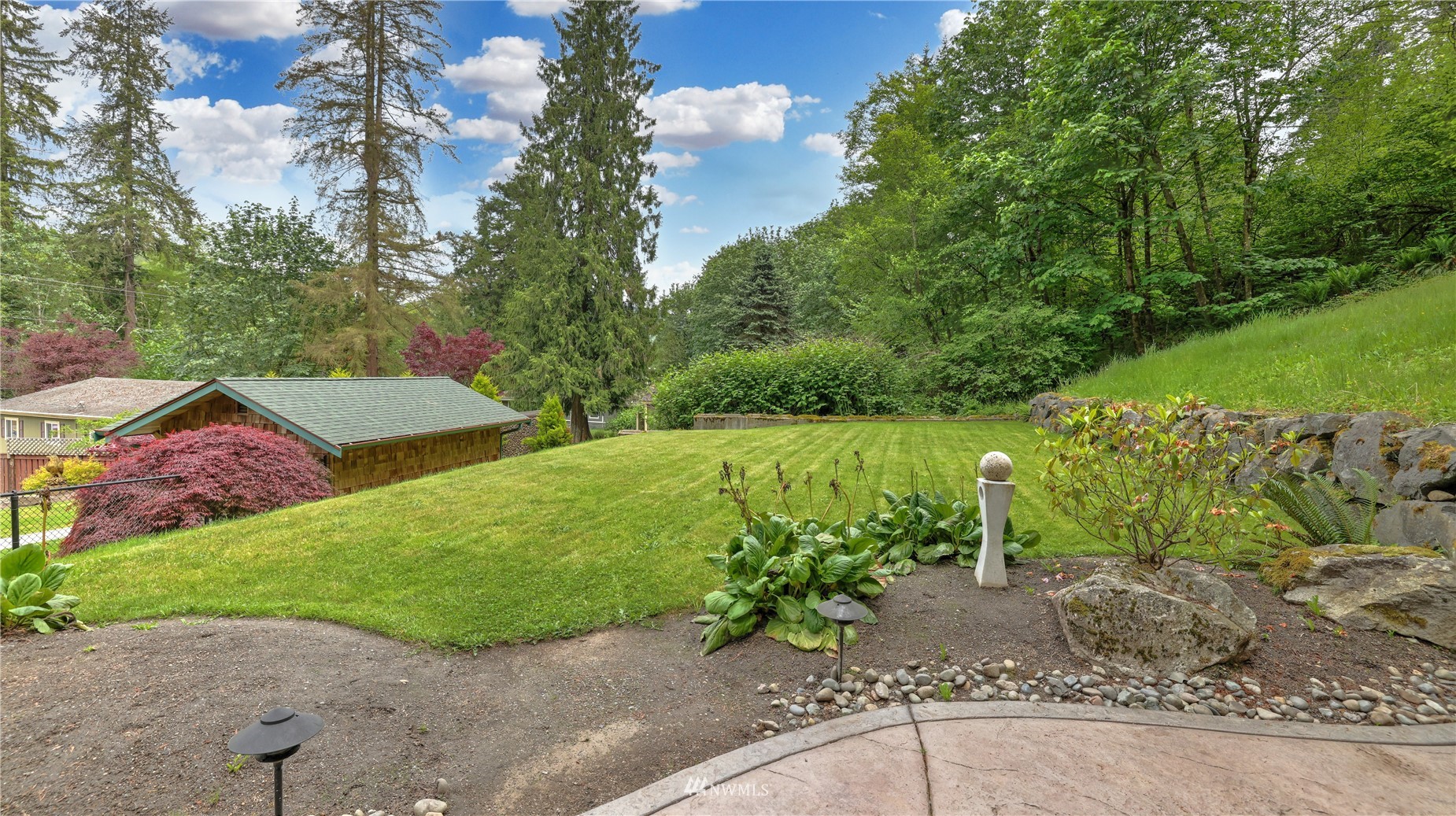 16819 Renton Issaquah Road Southeast Renton, WA 98059 - Photo 32 of 36 a view of an outdoor space and a yard