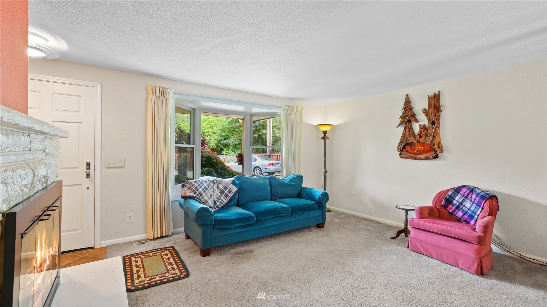 16819 Renton Issaquah Road Southeast Renton, WA 98059 - Photo 6 of 36 a living room with furniture and a window