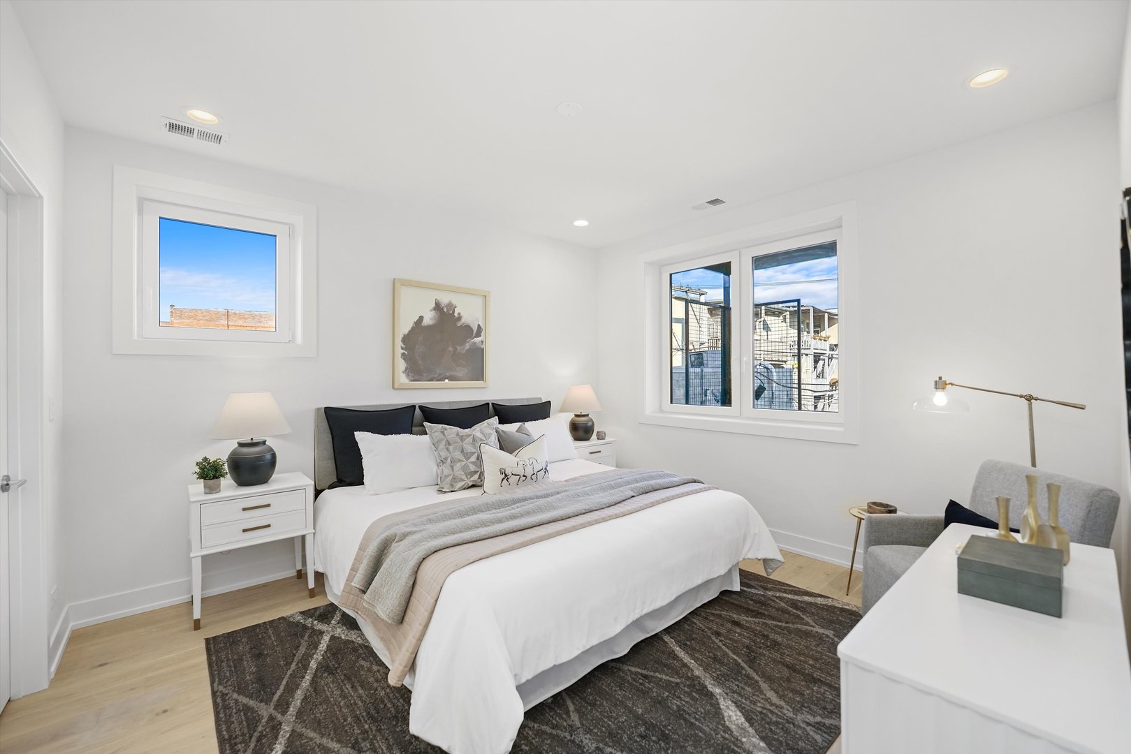 4647 North Clark Street, Unit 2 Chicago, IL 60640 - Photo 9 of 10 a bedroom with a bed and a window