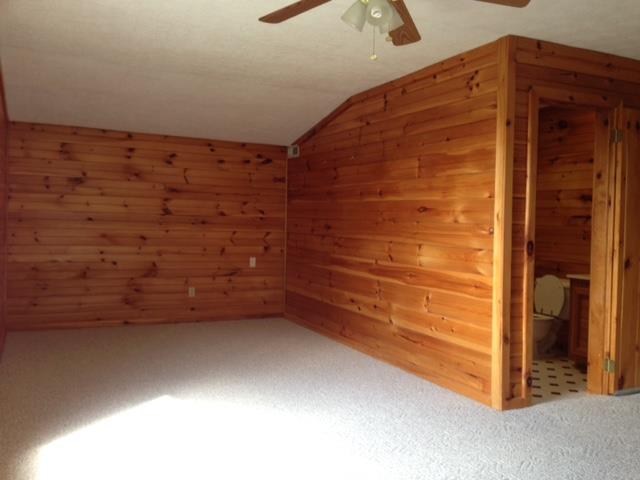 100 Kangaroo Ridge Road Byrdstown, TN 38549 - Photo 14 of 26 L shaped bonus room upstairs is 23x10 & 11x10