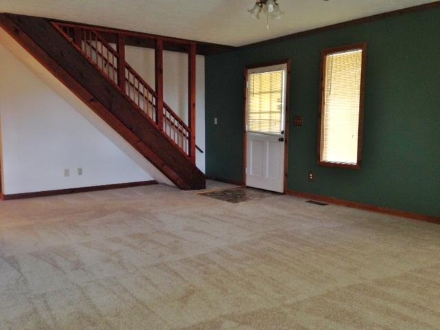 100 Kangaroo Ridge Road Byrdstown, TN 38549 - Photo 3 of 26 Living room with stairs