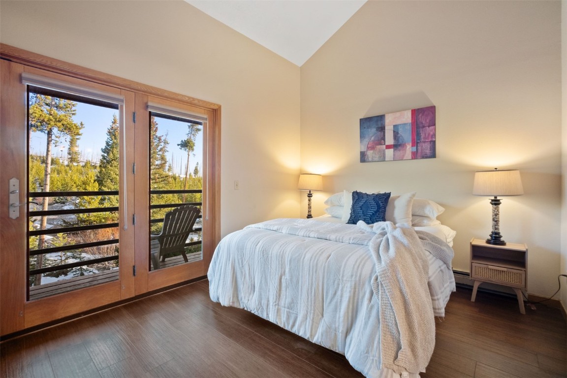 91400 Ryan Gulch Road, Unit 91425 Silverthorne, CO 80498 - Photo 14 of 42 a bedroom with a bed and a window