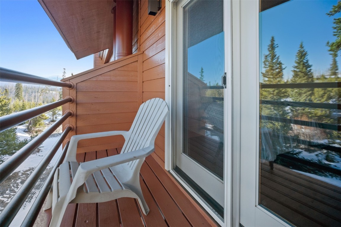 91400 Ryan Gulch Road, Unit 91425 Silverthorne, CO 80498 - Photo 16 of 42 a view of balcony with wooden floor
