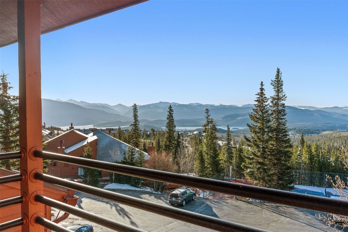 91400 Ryan Gulch Road, Unit 91425 Silverthorne, CO 80498 - Photo 3 of 42 a view of a city skyline from a balcony
